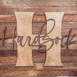 Monogrammed Family Name Sign on Farmhouse Lath